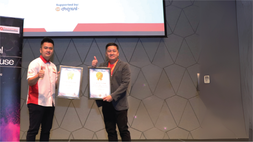 EAN Label receiving an award as Malaysia's leading packaging printing supplier and industry recognition